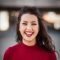 woman-smilling-in-red-top-and-red-lipstick-square-e1544061815643